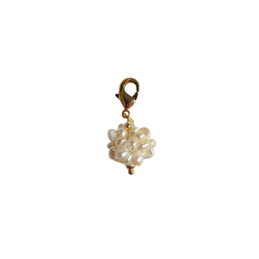The Pearl Cluster Charm